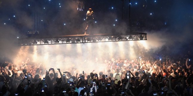 Fan Attempts to Climb Kanye’s Flying Stage in Atlanta