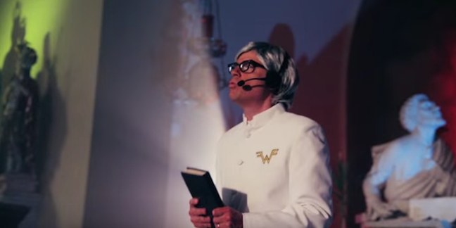 Rivers Cuomo Plays a Corrupt Preacher in Weezer's "Thank God for Girls" Music Video