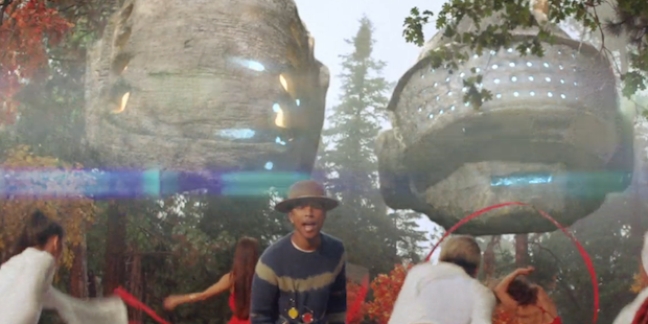 Pharrell Performs with Aerialists, Floating Daft Punk Helmets in "Gust of Wind" Video 