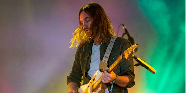 Watch Tame Impala Get Pelted With Cushions at a French Concert
