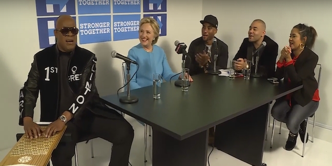 Hillary Clinton on “The Breakfast Club”: Stevie Wonder Sings “Happy Birthday,” Clinton Jokes About Death Row Records Meme