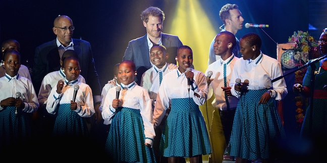 Watch Prince Harry Perform With Coldplay