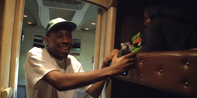 Tyler, the Creator Gets Fan to Lick Vomit for Money in New Behind-the-Scenes Tour Video